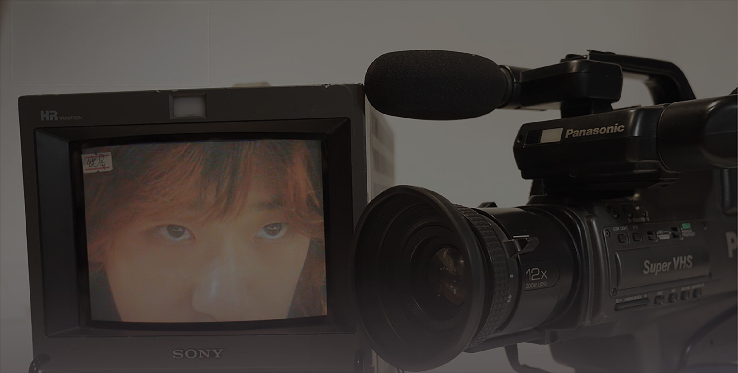 A woman placing her hand at the interactive installation.