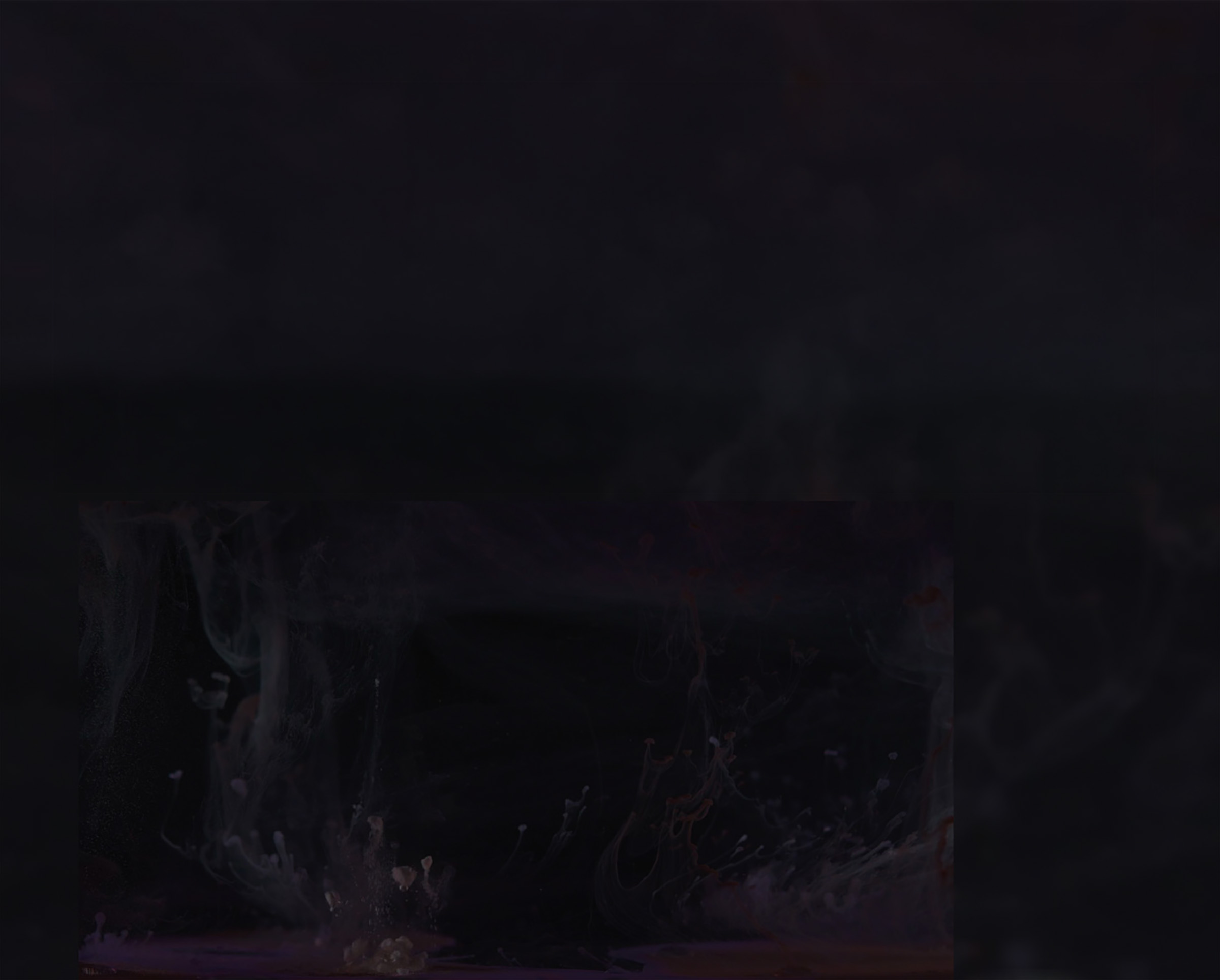 A woman placing her hand at the interactive installation.