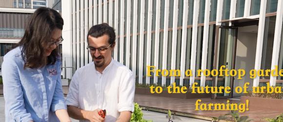 A reporter and Professor Andy Garcia on the rooftop garden