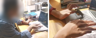 A person using the keyboard on a laptop