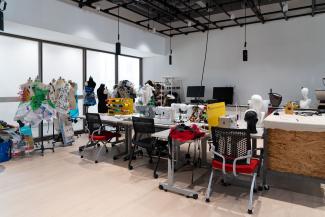 Studio 2 soft lab space with clothes made of recycled materials