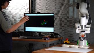 Student examining the computer model