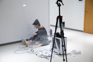 Capstone student performing for final presentation