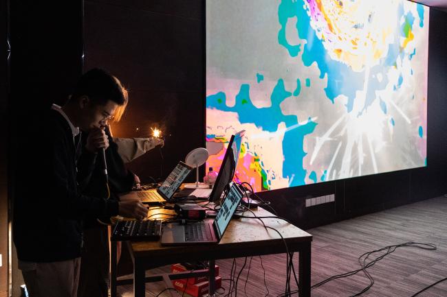 A student doing a presentation on an audiovisual project