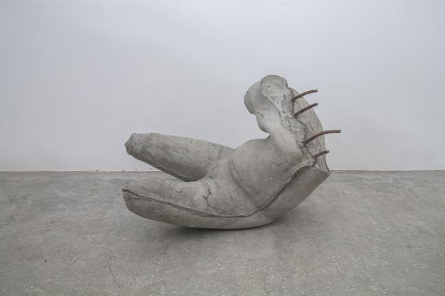 An abstract exhibition piece with concrete and steel