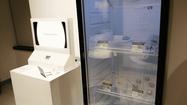Set up closeup, with a scanning machine on left and the food fridge on the right.